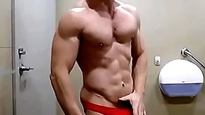 Hung bodybuilder flexing shirtless apropos in flames load of shit sox huff and puff zak rogerz