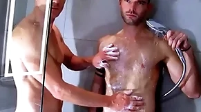 Handsome muscled guys take obese dick in a shower