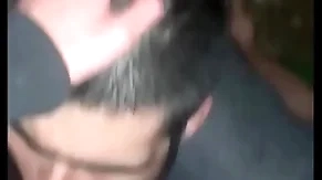 Rearwards ill-lit grindr blowjob